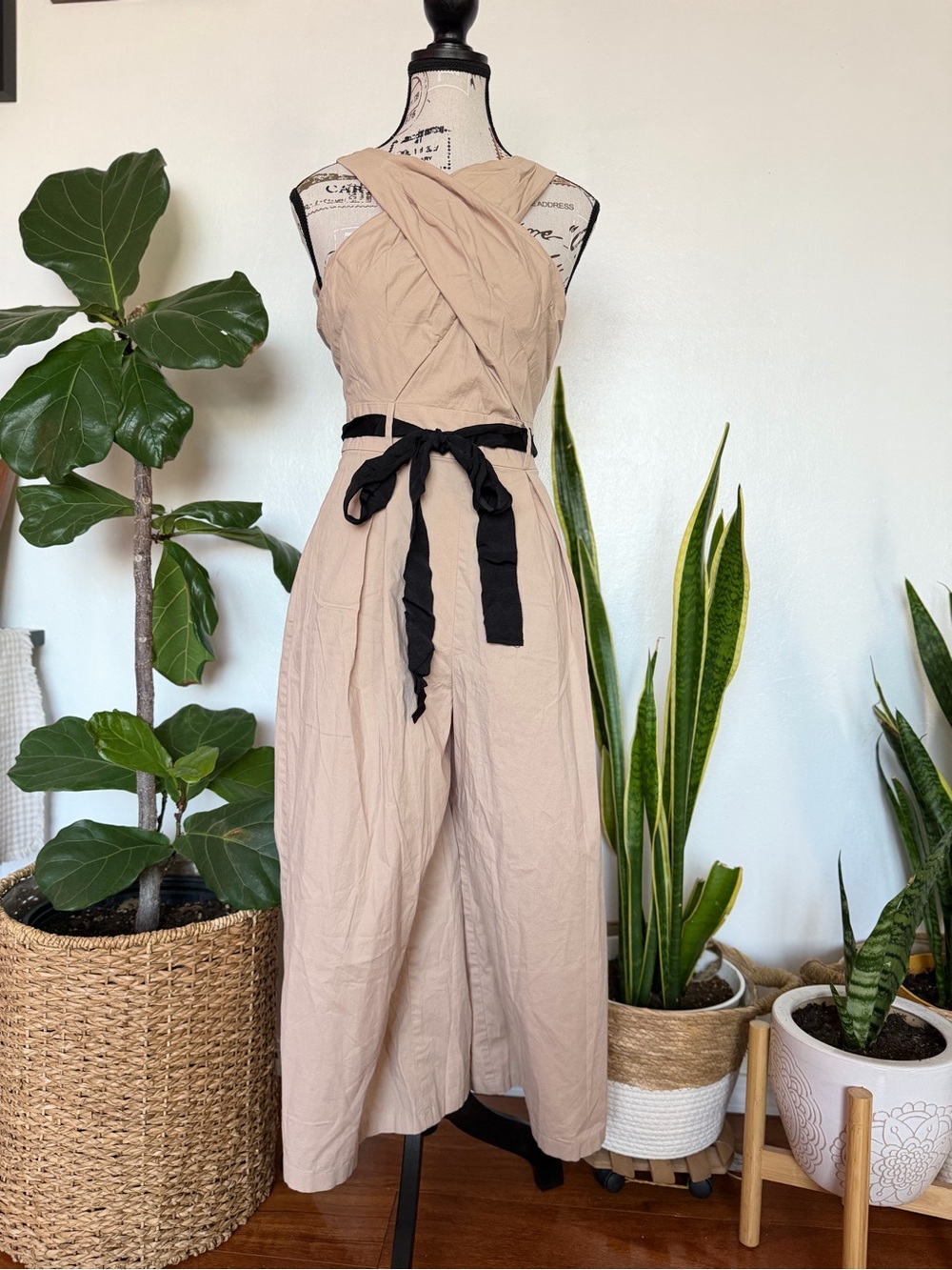 1901 Blush Beige Sleeveless Cross-Front Jumpsuit with Black Waist Tie